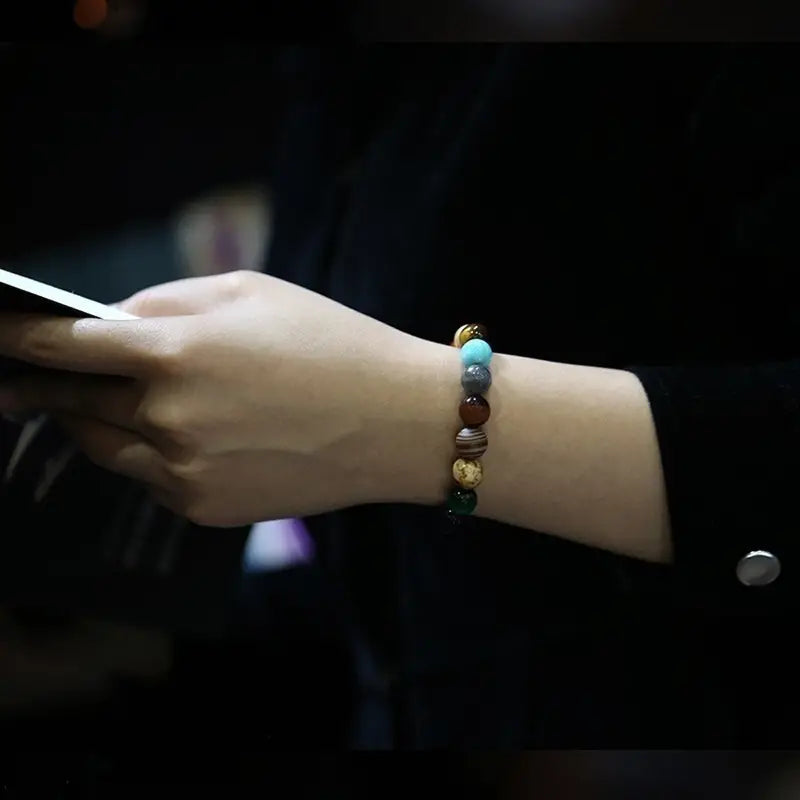 Brazalete pulsera planetario – Vista adicional – Disponible en NQLN Store Venezuela