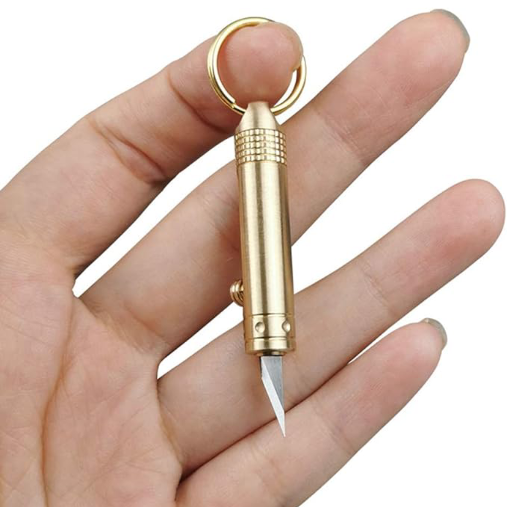 Mini cuchillo retractil de laton – Tienda online NQLN Store Venezuela