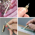 Mini cuchillo retractil de laton – Vista de cerca del producto – NQLN Store