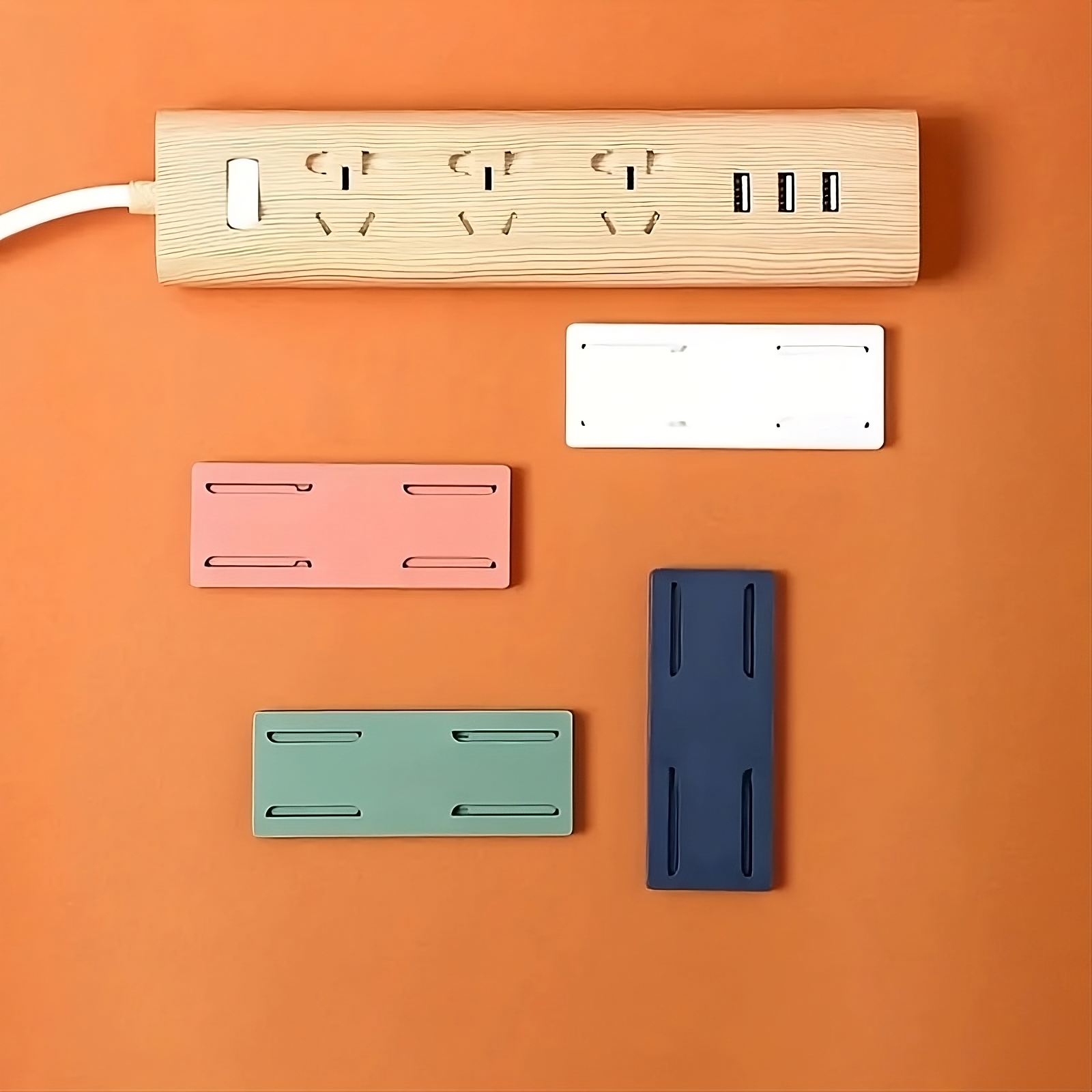 Fijador para regleta de pared autoadhesivo multifuncional – Vista adicional – Disponible en NQLN Store Venezuela