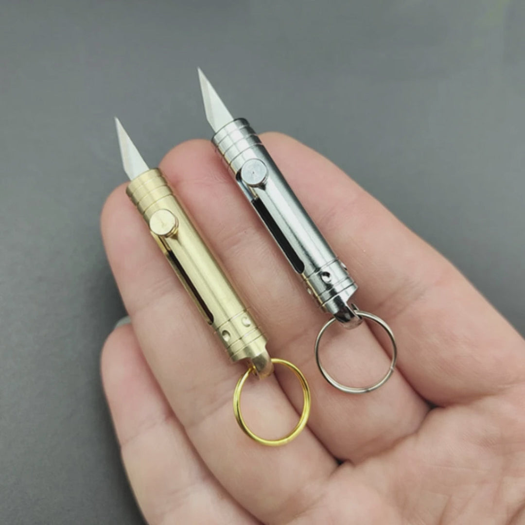 Mini cuchillo retractil de laton – Disponible en NQLN Store con envío gratis desde $20